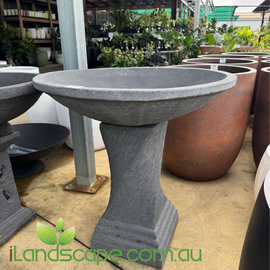 Decorative garden bowl with twisted pedestal base, perfect for feature planting