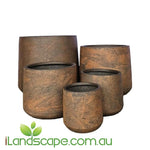 Modstone cylinder planter pot with a smooth, modern finish in a neutral tone